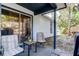 Patio featuring a table and chairs with a view of the backyard at 2721 Baird Ct, Palm Harbor, FL 34684