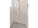 Modern bathroom with a tiled walk-in shower and sleek fixtures at 3023 Minuteman Ln, Brandon, FL 33511
