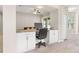 Office features hardwood floors, white cabinetry, and natural light at 3023 Minuteman Ln, Brandon, FL 33511