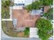 Overhead aerial view of the house showing the roof, yard, and neighborhood at 3324 W Saint Joseph St, Tampa, FL 33607