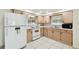 Corner kitchen with modern appliances, sink, and ample lighting at 3324 W Saint Joseph St, Tampa, FL 33607