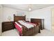 Inviting main bedroom with wood furnishings, and tile flooring at 3324 W Saint Joseph St, Tampa, FL 33607