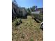 Backyard featuring a grass yard at 3710 N 57Th St, Tampa, FL 33619