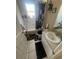 Bathroom features a bathtub, shower and decorative shower curtain at 3710 N 57Th St, Tampa, FL 33619