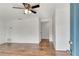 Bright living area featuring new flooring, modern ceiling fan, neutral paint, and an open floor plan at 3929 Cochise Ter, Sarasota, FL 34233