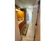 Bathroom featuring a vanity, shower and bathmat with a patterned rug at 5025 Westshore Dr, New Port Richey, FL 34652