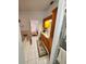 Bathroom featuring a tub, shower, vanity with natural light and a bedroom view at 5025 Westshore Dr, New Port Richey, FL 34652