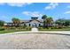 Community center with charming architecture and lush landscaping at 5043 White Chicory Dr, Apollo Beach, FL 33572