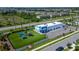Bright and modern building with a playground and ample parking space in a Gathering-friendly neighborhood at 5043 White Chicory Dr, Apollo Beach, FL 33572