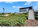 Entrance to the community of Lynwood featuring lush landscaping at 5043 White Chicory Dr, Apollo Beach, FL 33572