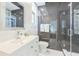 Bathroom features a modern sink with great lighting, glass enclosed shower with tile surround at 5212 62Nd S Ave, St Petersburg, FL 33715