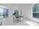 Elegant dining area with modern table setting and water views at 5212 62Nd S Ave, St Petersburg, FL 33715