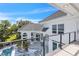 Balcony view of the pool and patio area of this waterfront home at 5212 62Nd S Ave, St Petersburg, FL 33715