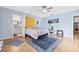 Bedroom with wood floors and en-suite bathroom access at 603 Royal Crest Dr, Brandon, FL 33511