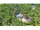 Birds eye view of a single Gathering home in a verdant, tree-lined neighborhood at 706 S 56Th St, Tampa, FL 33619