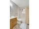Bathroom features wooden vanity with shower and tub combination at 706 S 56Th St, Tampa, FL 33619