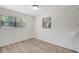Bright dining area features neutral wall color and hardwood floors at 706 S 56Th St, Tampa, FL 33619