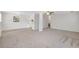 Spacious living room with open floor plan to kitchen and nice natural light at 706 S 56Th St, Tampa, FL 33619
