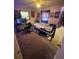 Personalized bedroom with dark carpet and décor, perfect for relaxation and rest at 7620 32Nd S Ave, Tampa, FL 33619