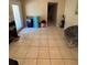 Inviting entryway with tile floors, offering a warm welcome to the home at 7620 32Nd S Ave, Tampa, FL 33619