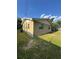 A view of the side of a house with a brick foundation and an A/C unit at 7620 32Nd S Ave, Tampa, FL 33619
