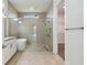 Modern bathroom boasts a frameless shower and freestanding soaking tub at 8421 Ivy Stark Blvd, Wesley Chapel, FL 33545