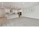 Kitchen includes stainless steel appliances, granite counters, and island at 8421 Ivy Stark Blvd, Wesley Chapel, FL 33545