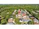 An aerial view shows the density of homes and mature trees within the community at 8820 Cypress Hammock Dr, Tampa, FL 33614
