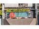 Aerial view of a backyard pool, enclosed with a screen, and an orange umbrella at 8820 Cypress Hammock Dr, Tampa, FL 33614