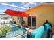Outdoor living at its finest: luxurious pool with outdoor furniture and a grill at 8820 Cypress Hammock Dr, Tampa, FL 33614