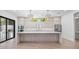 Open kitchen features a large kitchen island, modern appliances, and plenty of cabinet space at 910 W Virginia Ave, Tampa, FL 33603