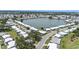 Community homes surrounding a serene lake, offering peaceful waterfront living at 9690 41St N St # 0, Pinellas Park, FL 33782