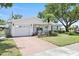 Home with a front yard and a long driveway at 9690 41St N St # 0, Pinellas Park, FL 33782