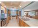 Spacious kitchen with stainless steel appliances and a connected dining area at 9690 41St N St # 0, Pinellas Park, FL 33782