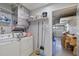 Functional laundry area features appliances and space for storage and cleaning supplies at 9690 41St N St # 0, Pinellas Park, FL 33782