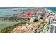 Scenic aerial view of waterfront homes with canal access near bay and beach at 101 Marina Del Rey Ct, Clearwater, FL 33767