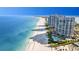 Expansive beachfront condos with a luxurious pool and stunning ocean views from above at 101 Marina Del Rey Ct, Clearwater, FL 33767