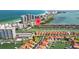 Beautiful aerial view of waterfront homes on the bay and beach with city views at 101 Marina Del Rey Ct, Clearwater, FL 33767