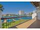 Private balcony with a picturesque view of the waterfront and surrounding community at 101 Marina Del Rey Ct, Clearwater, FL 33767