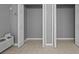 Open closet space with bi-fold doors and air conditioning unit in a bright living space at 101 Marina Del Rey Ct, Clearwater, FL 33767