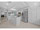 Bright, spacious kitchen featuring an island, stainless steel appliances, and ample cabinet space at 101 Marina Del Rey Ct, Clearwater, FL 33767