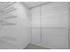 Walk-in closet with shelving for optimal storage at 101 Marina Del Rey Ct, Clearwater, FL 33767