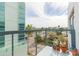 Balcony view showing cruise ship and harbor with various potted plants at 101 N 12Th St # 400, Tampa, FL 33602