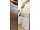 Functional walk-in closet with built-in shelving and abundant storage including wash machine and dryer at 101 N 12Th St # 400, Tampa, FL 33602