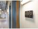 Close-up of unit number 400 in the hallway with visible industrial piping above at 101 N 12Th St # 400, Tampa, FL 33602