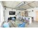 Open-concept living and kitchen area with modern furnishings and stainless steel appliances at 101 N 12Th St # 400, Tampa, FL 33602