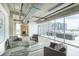 Bright lounge area with comfortable seating and expansive windows with city views at 101 N 12Th St # 400, Tampa, FL 33602