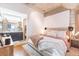 Bright main bedroom featuring a king size bed, walk-in closet, and industrial chic accents at 101 N 12Th St # 400, Tampa, FL 33602