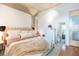 Bright main bedroom featuring a king size bed, walk-in closet, and industrial chic accents at 101 N 12Th St # 400, Tampa, FL 33602