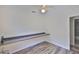 Bright office space featuring wood-look tile, desk, and natural light at 1019 Lakeside Dr, Seffner, FL 33584